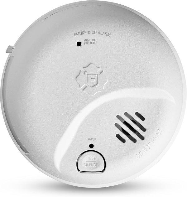 Smoke and carbon monoxide alarm hardwired detector installed on ceiling for home safety protection