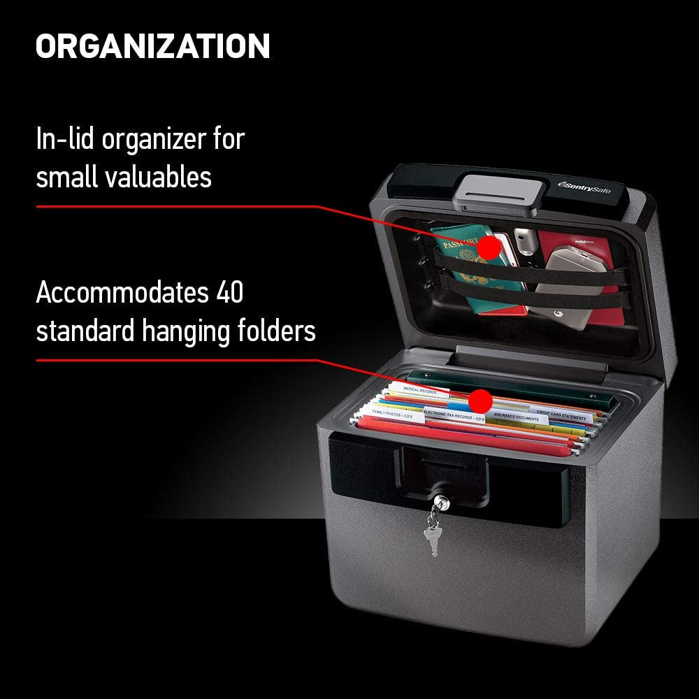Fireproof safe box interior showing organized file folders and important documents storage