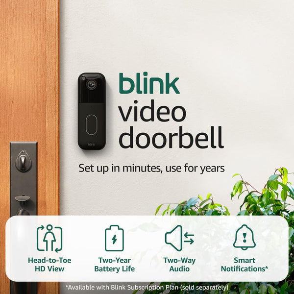 Battery video doorbell installed on a modern front door with HD camera